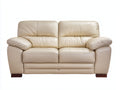 Zweisitzer Sofa in Lederoptik 185 x 96 x 92 cm - Cremebeige - Klassisches Komfortdesign mit Holzfüßen für Wohnzimmer und Gästezimmer